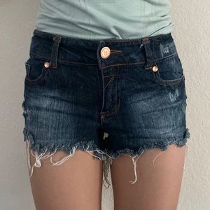 Dark wash jean short shorts, distressed look. Size 0. Highway Jeans.